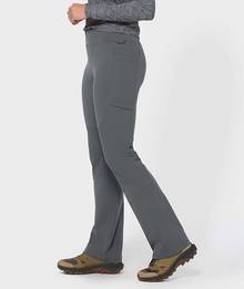 Woman wearing grey stretchy work pants.